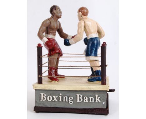 MONEY BOX: A 20th century cast iron hand painted style money box in the form of a Boxing ring. With moving figures. 
