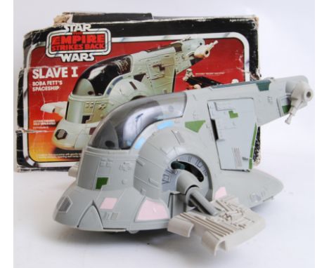 STAR WARS: An original vintage Star Wars Empire Strikes Back Palitoy made Slave 1 ship. Within the original box.