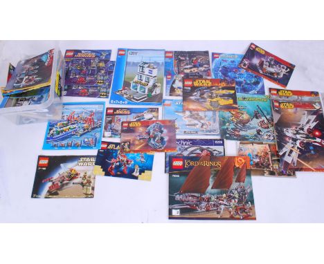 LEGO: A collection of 30+ vintage and assorted Lego set instructions and booklets. Various sets to include Lord Of The Rings,