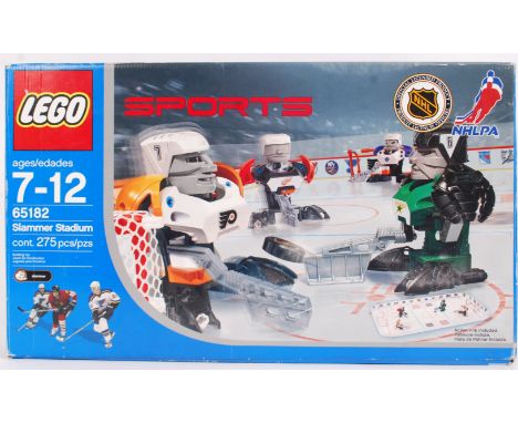 LEGO: A Lego Sports set 65182 Slammer Stadium. Believed complete, but unchecked. With base and figures. Also with internal bo