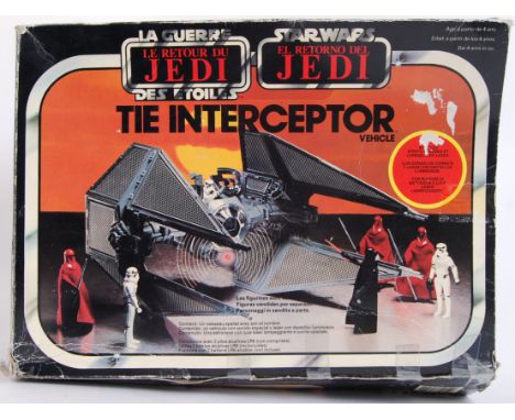 STAR WARS: A vintage original trilogy Star Wars Tie Interceptor spaceship vehicle. Within the original box. Made by Palitoy.