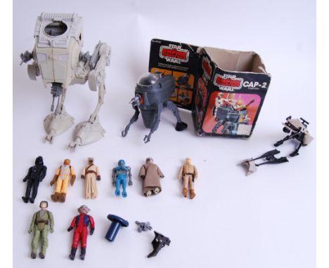 STAR WARS: A collection of assorted vintage Star Wars figures and vehicles to include; Cap-2 (with box), Scout Walker. Some l