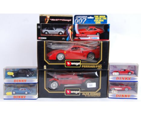 DIECAST: A collection of boxed diecast to include; two 1:18 scale boxed diecast model Burago Ferraris, 4x Dinky models DY-3, 