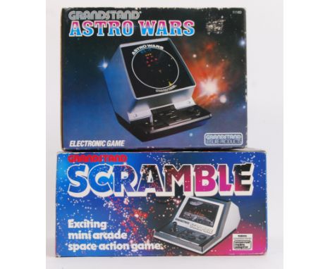 GRANDSTAND; Two vintage Electronic Grandstand boxed games - Astro Wars and Scramble. Both in good original boxes.