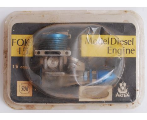FOK 15 ENGINE; An original vintage FOK 15. 1.5ccm model aircraft diesel engine by Artex. Appears unused, within the original 