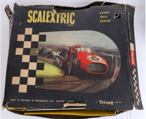 SCALEXTRIC: An original early vintage Scalextric Grand Prix Series boxed set. Appears to come with 2x extra cars. Unchecked, 