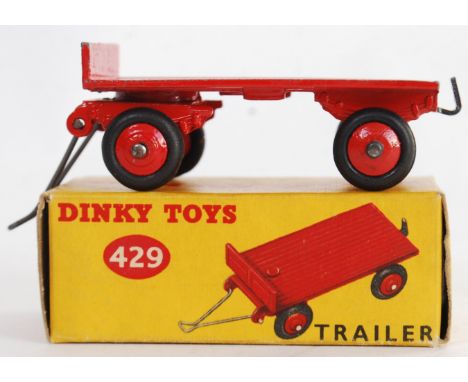 DINKY: An original vintage Dinky Toys 429 Trailer diecast model. Red, within a good original box. 

NOTE: From a superb singl