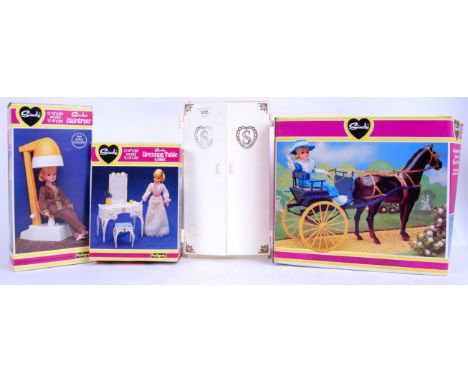 SINDY: A collection of original vintage Pedigree Sindy items (mostly boxed) to include; Dressing Table, Gig, Hairdryer and a 