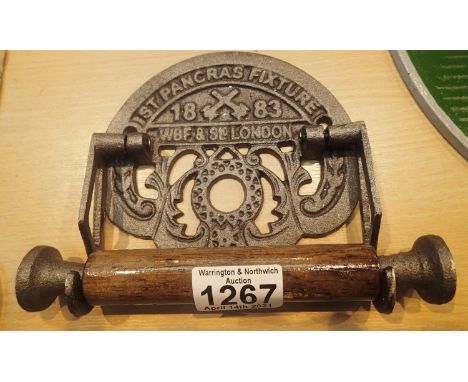 Cast iron St. Pancras toilet roll roller, L: 20 cm. P&amp;P Group 1 (£14+VAT for the first lot and £1+VAT for subsequent lots