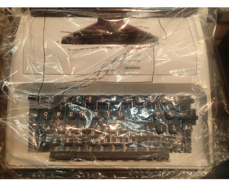 Boxed modern Cariva typewriter. Not available for in-house P&amp;P, contact Paul O'Hea at Mailboxes on 01925 659133 