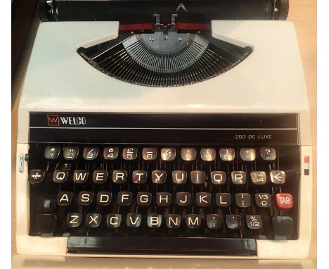 Welco portable 250 deluxe typewriter. Not available for in-house P&amp;P, contact Paul O'Hea at Mailboxes on 01925 659133 