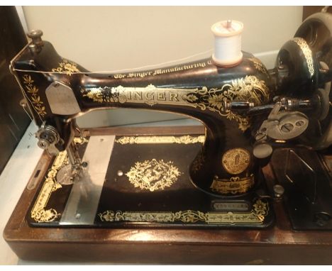 Cased vintage hand powered Singer sewing machine. Not available for in-house P&amp;P, contact Paul O'Hea at Mailboxes on 0192