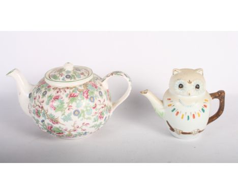 A collection of decorative ceramic teapots, thirty-six approx
