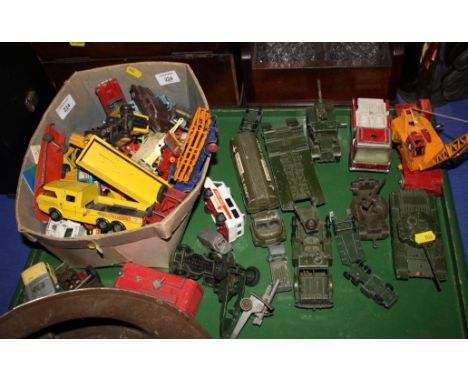 A Dinky model of a Centurion tank with transporter and other military vehicles, field guns, etc