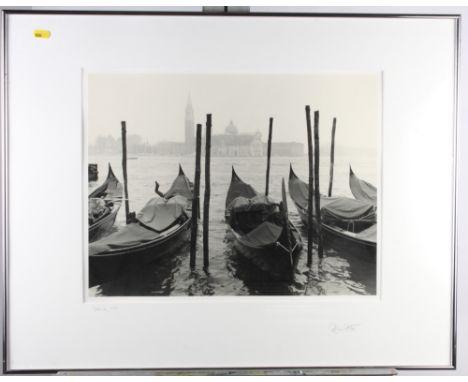 Robert Preston: a pencil signed photographic print of gondolas entitled "Venice 1999", 14" x 19", in silvered frame, and a co