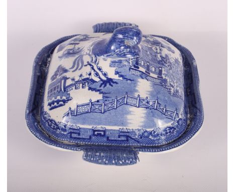 A 19th Century Willow pattern meat dish (damages) and a quantity of other blue and white tureens and plates, etc