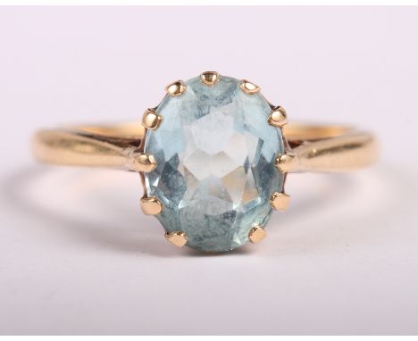 A 9ct gold and aquamarine single stone dress ring, size Q/R, and a 9ct gold mounted aquamarine pendant on chain