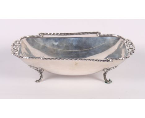 A Peruvian sterling silver dish with scrolled handles, 8.2oz troy approx