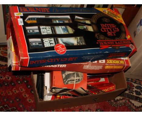 A collection of six model railways including Triang, Hornby and Bachmann, together with a Triang combat unit and a helicopter