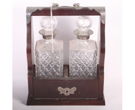 A modern two-bottle tantalus with key