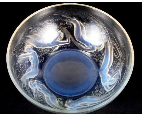 A 1920s Rene Lalique "Ondines" glass bowl, decorated with naked maidens, signed R Lalique, 8 1/4" wide (chips to rim)