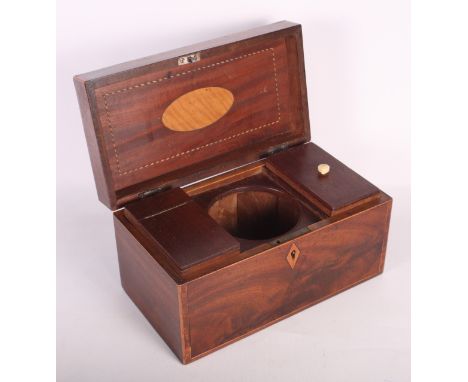 A 19th Century crossbanded mahogany tea caddy, fitted two compartments and central mixing bowl recess, 11" wide