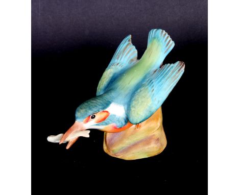A collection of nine Royal Worcester china models of birds: a thrush, blue tits, a robin, a goldfinch, a wren, a kingfisher, 