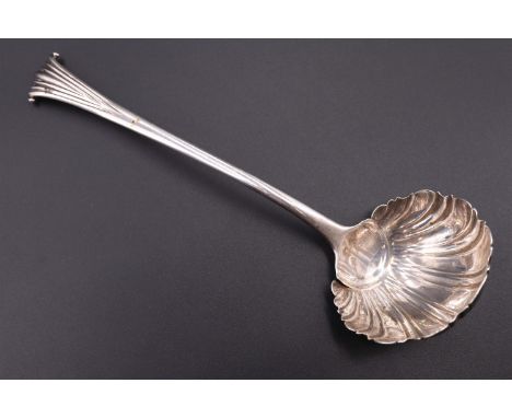 A George III silver Onslow pattern sauce ladle, having a shell form bowl, (assay marks obscured, possibly London, 1763), 47 g