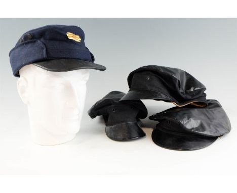 Three vintage British Rail peaked caps, size 7, together with a BR Guard's cap and badge, size 7 1/4