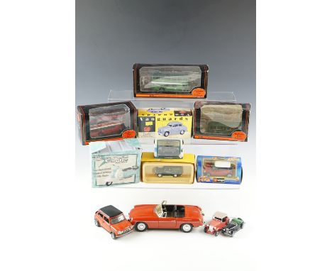 A group of Corgi, Burago, Matchbox and other diecast cars and buses together with a boxed Vanguards "Austin A35" and a boxed 