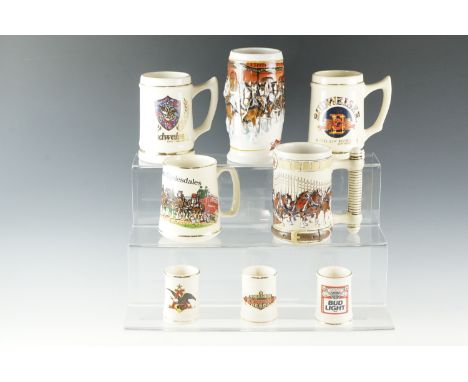 A group of Budweiser ceramic tankards, tallest 18 cm 