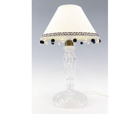 A cut glass table lamp, 34 cm to top of socket