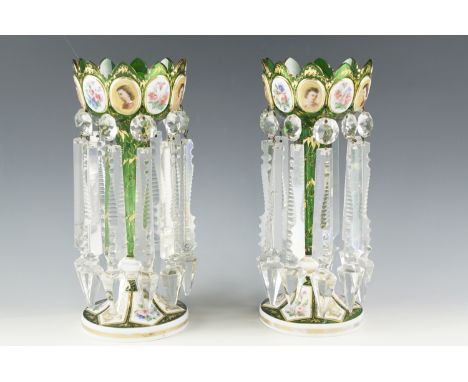 A pair of 19th Century Bohemian style glass lustres, the vases decorated with floral and portrait enamelled plaques on a gilt