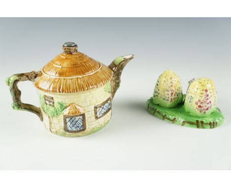 A Beswick Cottage Ware teapot together with a Royal Winton "Beehive" salt and pepper set, former 13 cm