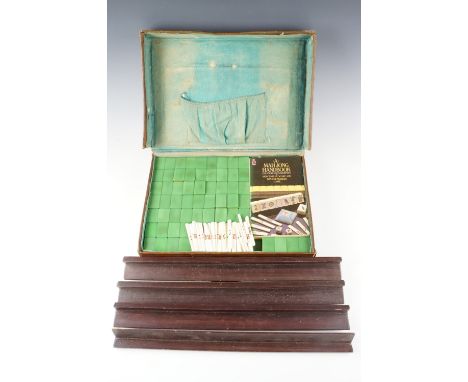 A 1930s / 1940s Wushunsing Mahjong set, with composition and bone playing pieces and four tile racks 