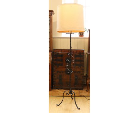 A wrought iron standard lamp, 155 cm to socket