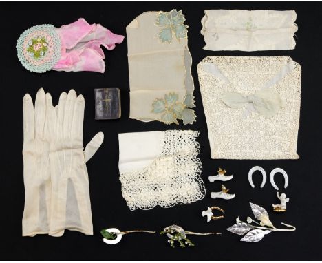 Vintage wedding items including wax and fabric corsages, cake decorations, handkerchiefs and silk gloves together with a mini