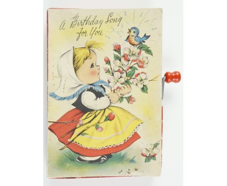 A 1950s hand-cranked musical birthday card, playing the tune of "Happy Birthday", by Kaye-Kards Ltd and Selcol, 14 x 10 cm