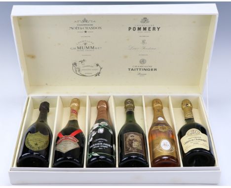 A Relais &amp; Chateaux cased collection of vintage Champagne, comprising Moet et Chandon "Cuvee Dom Perignon Vintage 1985", 