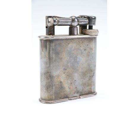 A 1930s Dunhill electroplate table lighter, patent number 390107, 10.5 cm