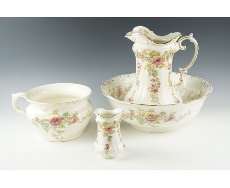 A late Victorian / Edwardian S Fielding &amp; Co "Flora" pattern wash set, basin 40 cm diameter