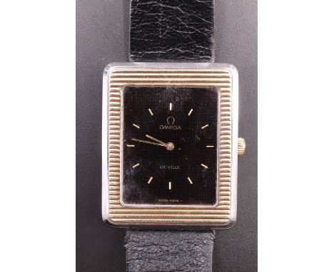 A 1970s Omega DeVille dress wristwatch, having a calibre 625 manual-wind movement and rectangular black face with fine gilt b