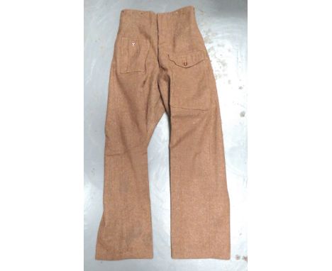 Pair 1940 Pattern Battle Dress Trouserskhaki woollen, wide leg trousers.  Right hip with small first aid pocket.  Front of le