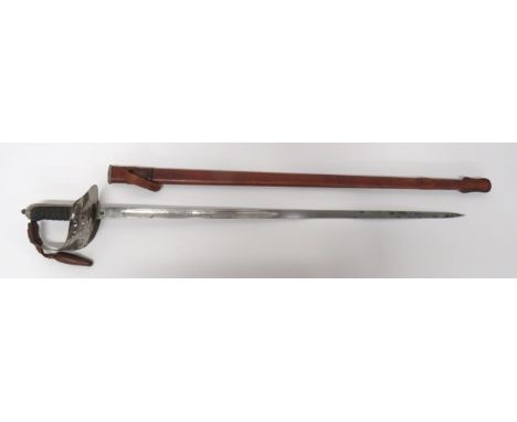 1897 Pattern Infantry Officer's Sword32 1/2 inch, dumb bell blade with central fuller.  Etched foliage scrolls and crowned GR