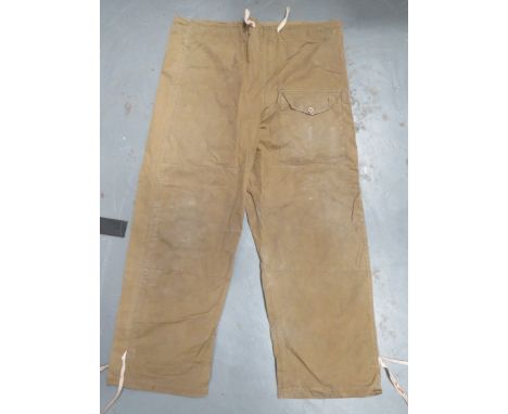 WW2 Green Windproof Over Trouserskhaki green, windproof cotton, wide leg over trousers.  Front of left leg with large patch p