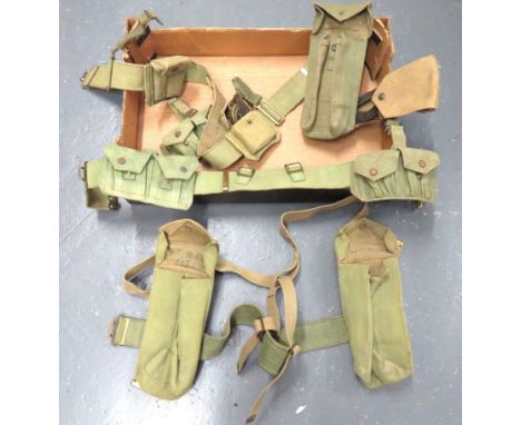 Selection Of 1937 Pattern Webbing Equipmentincluding pair of pouches fitted on belt with cross straps ... Pair of double pouc