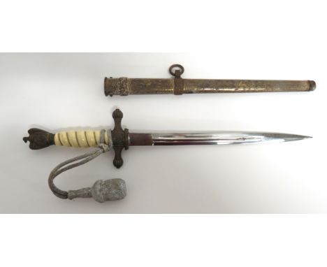 WW2 German Third Reich Kriegsmarine Officer's Dagger10 inch, double edged blade.  Narrow, double fullers.  Gilt brass crossgu