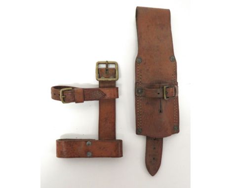 WW1 1914 Pattern Leather Helve Carrier And Bayonet Frogscarce example of brown leather with brass buckles and fittings.  The 
