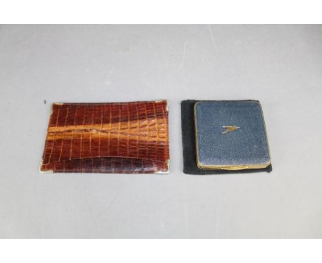 Boac compact and crocodile wallet