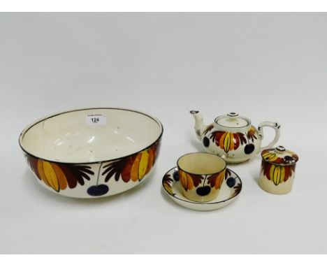 Collection of Robert Heron & Son Scottish pottery painted with autumn leaves and berries, to include a bowl, small teapot, cu